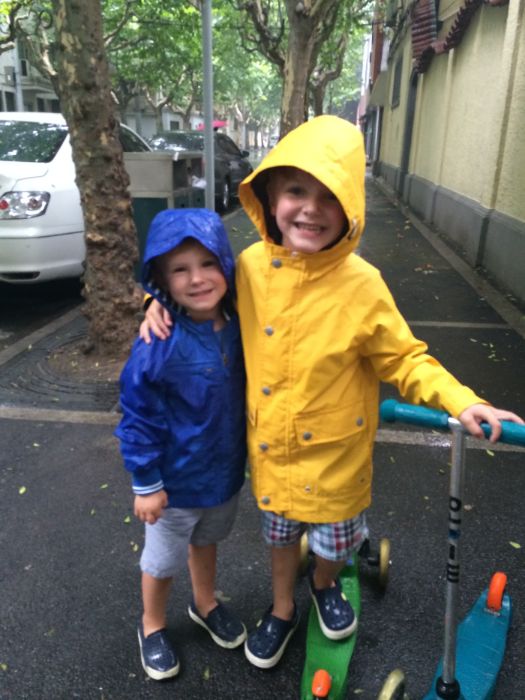 Max and Rex in raincoats, Shanghai